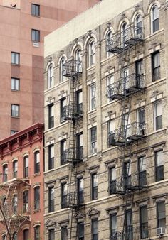 fire escapes on the side of an apartment building