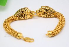 22kt yellow gold antique stylish handmade fabulous lion bracelet for men, top class hallmarking jewelry from Rajasthan india Width- 9mm to 13 mm(lion face). Metal-22 karat gold. Stamped-916/22kt complete hallmarked. Type-Lion face bracelet. length and weight chart: 7 inches-25.520 grams 7.5 inches-27.030 grams 8 inches-29.120 grams 8.5 inches-31 grams 9 inches-32.760 grams Makes excellent gift item and collection piece. for more information please see the photo's gold jewelry is handmade designe Bracelets Gold For Men, Gold Jewellery For Men, Gold Bracelet For Men Design, Unique Gold Chain Designs For Men, Kadiyam For Men Gold, Men Gold Bracelet Design Unique, Men Gold Pendant Design, Lion Kadiyam For Men Gold, Gold Bracelet Men