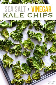 sea salt and vinegar kale chips on a baking sheet with the title above it