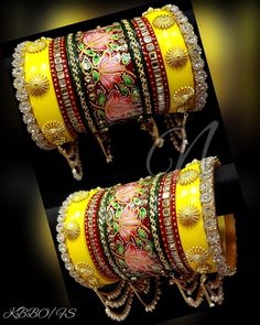 Heavy Handmade Bangles, Bridal Chura, Fancy Wedding Bangle Set, Punjabi Chuda, Party Wear Bangles, Indian Bangles, Rajputi Chura Jewelry  Available Sizes - 2.4/2.6/2.8 inch (Diameter) Beautiful heavy hand work hand made chura with Hand painted & Kunda Work center kada makes the design awesome. Both side yellow kada is a charm in the design and which highlight the chura and attract the attention of each and everyone.  This beautiful color combination chura is a perfect bangle set for any occasion like bridal shower/ wedding Party/ Reception / Festival / Parties / Bride etc. What do bangles represent? Bangles are traditionally a part of the solah shringar of Indian brides. It is mandatory for newly wed brides and would-be-brides to wear bangles made of glass, gold or other metals as they sig Yellow Bangles Set, Yellow Bangles, Bangles Bridal, Red Bangles, Bridal Chura, Bridal Jewelry Necklace, Bangles Set, Indian Jewellery Design Earrings, Fancy Wedding