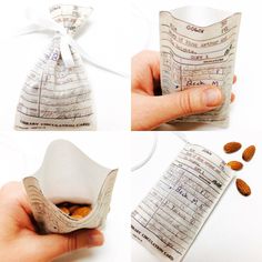 someone is making a paper bag with music notes and almonds