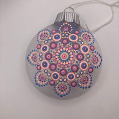 a glass ornament with an intricate design on it