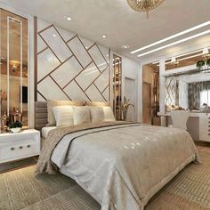 a large bed sitting under a chandelier in a bedroom