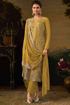 Introducing our Designer Salwar Suit, crafted to make a statement this festive season! This semi-stitched ensemble exudes luxury with its Heavy Silk top, complemented by a smooth Heavy Dull Santoon Silk bottom for that perfect drape. The rich Heavy Silk Dupatta adds a touch of elegance, all adorned with intricate embroidery work, creating a timeless look. Designed for festive wear, this suit offers maximum length of up to 42, allowing you to tailor it perfectly to your style. Please note that sl Lehenga Suit, Party Wear Lehenga Choli, Lehenga Style, Designer Salwar, Silk Bottoms, Designer Salwar Suits, Party Wear Lehenga, Bridal Lehenga Choli, Festive Wear