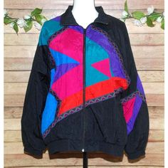 Vintage Milano Sport Black Retro Full Zip Windbreaker Jacket Size L Totally 80's Bright Colorblock Please SEE measurements of the clothing items to insure fit! Measurements are in the last photo. To check measurements, measures a well fitting garment laying flat unstretched. We double the measurement for bust/chest/waist/hip/thigh and leg opening. Length is measured from shoulder to hem. Inseams are measured along the inseam. When you see TWO measurement for one area it is because the item has s Vintage Patchwork Windbreaker For Fall, Black Long Sleeve Retro Windbreaker, Retro Black Hooded Windbreaker, Black Retro Windbreaker, Retro Black Windbreaker For Outdoors, Retro Black Windbreaker For Outdoor, 90s Style Black Windbreaker For Fall, Retro Multicolor Track Jacket For Fall, Retro Multicolor Track Jacket For Outdoor