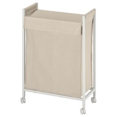 a white laundry hamper with wheels on it