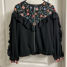 Black Zip Up Jacket With Floral Embroidery. Never Worn, New With Tags. Spring Black Outerwear With Floral Embroidery, Black Long Sleeve Outerwear With Floral Embroidery, Trendy Black Embroidered Outerwear, Maroon Jacket, Embroidery Jacket, Bike Jacket, Black Moto Jacket, Black Zip Ups, Bomber Jackets