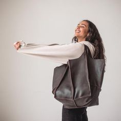 This handmade women tote bag is produced of Italian very soft  leather. It has one large compartment and has one pocket - inside. This bag is simple, reliable, and durable. Its universal look allows to use the bag for various purposes. One may take the bag to the work, shopping, meeting, or walk and feel comfortable with it at any conditions.SIze and Dimensions:Large:Height: 16.14 inches  (41 cm)Width: 12.2 inches  (31 cm) Depth: 10.2 inches  (26 cm)Inside pocket:Height: 12.2 inches  (31 cm) Wid Everyday Leather Bag, Soft Leather Hobo Bag, Large Shopper Bag, Slouchy Hobo Bag, Leather Hobo Bags, Slouchy Tote, Leather Shopper Bag, Large Leather Bag, Slouchy Bag