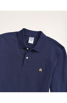 A classic in every way, you just can't go wrong spending your leisure hours in this long-sleeve polo made from a stretch piqué. Spread collar Long sleeves 98% cotton, 2% spandex Machine wash, tumble dry Imported Classic Navy Fitted Polo Sweater, Classic Long Sleeve Cotton Polo Shirt, Fitted Long Sleeve Polo Shirt For Golf, Classic Fitted Long Sleeve Polo Shirt, Classic Long Sleeve Polo Shirt With Ribbed Collar, Long Sleeve Cotton Polo Shirt For Golf, Cotton Long Sleeve Polo Shirt For Golf, Classic Long Sleeve Solid Polo Shirt, Classic Long Sleeve Golf Top