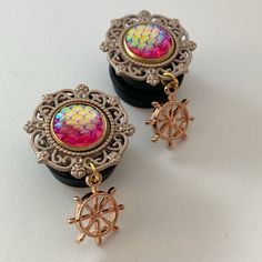 Add some flair to your stretched lobes with our stunning dangle plugs! these plugs are the perfect accessory for any occasion. The intricate designs and eye-catching dangles will make you stand out in a crowd. Whether you’re dressing up for a night out or adding some edge to your everyday look, our dangle plugs are the perfect choice. You will receive one pair of acrylic plugs with silicone O-rings.Setting measures about 24mm.2 "in length Our plugs are handcrafted to your order. Production time Cheap Dangle Plug Earrings For Women, Gauge Earrings Plugs, Lobe Earrings, Dangle Plugs, Gauge Earrings, Stretched Lobes, Fake Plugs, Ear Gauges, Gauged Earrings