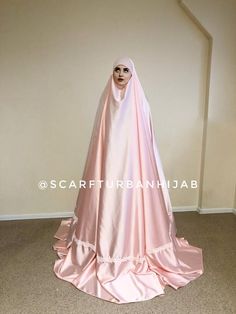 This amazing blush pink outfit consists of 2 parts - a long khimar and a long niqab. both parts made of soft silk, the frontal part is made of jersey . the peculiarity of our hijabs and the fact that they do not need to be tied up, they hold fast thanks to this fabric. the cut for eyes is decorated with a lace. This suit looks very elegant and will suit those who prefer the most closed style of cover.We accept custom orders and can change everything like you wanted, please contact us!At various Long Pink Abaya For Eid, Modest Wedding Niqab For Eid, Pink Long Abaya For Eid, Modest Style Khimar For Wedding And Eid, Traditional Pink Abaya For Wedding, Traditional Pink Wedding Abaya, Traditional Long Pink Abaya, Long Khimar For Wedding, Modest Pink Hijab For Eid