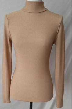 Long sleeve mock neck MetallicChampagne to match with any type of bottom you have at home. True to size Mock Neck Long Sleeve, Long Sleeve Top, Mock Neck, Champagne, Long Sleeve Tops, Sleeve Top, At Home, Sparkle, Long Sleeve