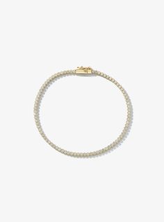 This 14k gold delicate tennis bracelet features 1.50ctw lab grown round diamonds. It's dainty size makes it the perfect tennis bracelet for daily wear on its own or stacked with other diamond and/or solid gold bracelets. Luxury Lab Grown Diamond Engagement Bracelet, Gold Tennis Bracelet With Prong Setting For Everyday Wear, Dainty Diamond White Tennis Bracelet, Classic White Gold Tennis Necklace For Everyday, Classic Everyday Diamond Bracelet With Diamond Cut, Dainty White Gold Tennis Bracelet For Everyday, Dainty Tennis Bracelet With Prong Setting, Dainty Yellow Gold Tennis Bracelet With Jubilee Style, Everyday Diamond Cut Tennis Bracelet