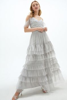 This ethereal maxi dress is sure to go straight to the top of your wish list. Draped with romantic tiered ruffles, it lends fairytale splendour to special occasions and features a flattering cold-shoulder bodice and slimline spaghetti straps. Dresses V Neck, Dress Silver, Skirt Maxi, Silver Dress, Lace Fashion, Tier Skirt, Tiered Skirt, Wish List, Dress Collection