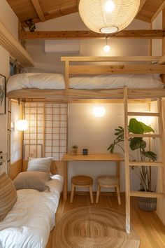 a bedroom with bunk beds and desk in it