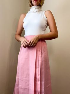 ⚡️ sweet high waisted a-line wrap skirt with accordion pleats at the front. beautiful soft pink color. made by Fundamental Things. 50% polyester 50% rayon. excellent condition! ⚡️ labeled size 14 (modeled on size small, 5'5") ⚡️ waist 15"  hips 19.5" length 27.5" ------------------------------------------------------------------------------------------- Please message questions prior to purchase. Once shipped, sales are final, no return/exchange. But please contact me if you have any problems wi Feminine Fitted A-line Skirt, Pink A-line Pleated Skirt, Pleated Flared Mini Skirt In Feminine Style, Feminine Pleated Full Skirt Bottoms, Feminine A-line Pleated Skirt, Feminine Mini Pleated Skirt With Relaxed Fit, Feminine Relaxed Mini Pleated Skirt, Elegant High Waist Pleated Skort, Elegant Full Tennis Skirt With Lining