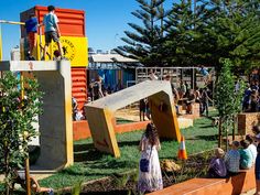 children are playing in an outdoor play area