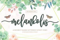 an artistic floral font with green leaves and butterflies