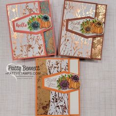 three cards with pumpkins and flowers on them