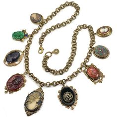 A Balkan fortune-teller would have worn such an opulent, mysterious necklace! The large ornamental charms -- cameos, carved jadeite and vintage glass -- are set in a collection of intriguing links that offer visual richness. Full of intricate detail, antique elements and a locket. Sure to be an object of admiration and curiosity! Mined from the mystique of gypsies and artisans that brought their imaginations to glassmaking in the early 20th century. A true limited edition piece. Hand crafted by Jewelry Upcycle, Victorian Bracelet, Victorian Necklace, Cameo Jewelry, Vintage Cameo, Sweet Romance, Cameo Necklace, Cameo Pendant, Funky Jewelry