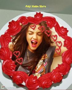 a cake with a woman's face and hearts on it