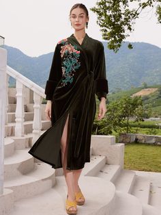 Experience the allure of Eastern luxury and elevate your everyday moments with this Luxury Velvet Kimono Robe for any occasion. Immerse yourself in the sumptuous feel of our ultra-soft, high-quality fabric, delicately adorned with stunning floral prints. - One size comfortably fits most- Up to 43" at chest and hips- A luxurious velvet robe with fur cuffs- Green velvet with vintage style flower embroidery- Front side tie closure - Belt loops and inside ties to secure closure- Relaxed fit with sli Embroidered Long Sleeve Robe For Loungewear, Elegant Long-sleeved Kimono With Floral Embroidery, Elegant Long Sleeve Kimono With Floral Embroidery, Robe With Fur, Embroidered Robe, Embroidered Robes, Fur Cuffs, Velvet Kimono, Silk Gifts