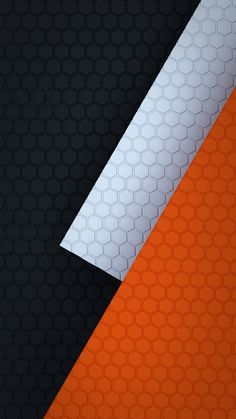 an orange and black wallpaper with white lines in the center, on top of it