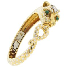 Vintage David Webb Panther Collection bangle. The bangle is made of 18K yellow gold and weighs 38.80 DWT (approx. 60.34 grams). It also has eight round G-color, VS-clarity diamonds weighing 1.00 CTTW, and two cabochon emeralds. Horse Bracelet, Hammered Bangles, David Webb, Gold For Sale, Antique Bracelets, The Bangles, Diamond Bangles Bracelet, Crystal Bangle, Cuff Bangle Bracelet