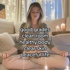 a woman sitting on the floor with candles in front of her and text that reads, good