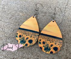 Wooden sunflower earrings. These are double sided! Beautiful and lightweight. Sunflower Dangle Earrings For Summer, Yellow Sunflower Design Earrings For Summer, Sunflower Design Drop Earrings For Summer, Summer Sunflower Dangle Earrings, Summer Sunflower Design Earrings, Adjustable Sunflower Design Earrings For Summer, Wooden Sunflower, Earrings Aesthetic, Sunflower Earrings