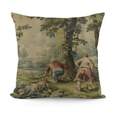 a pillow with an image of two men in the woods and one dog laying on the ground