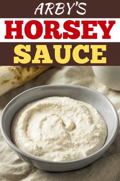 a bowl filled with horsey sauce on top of a table