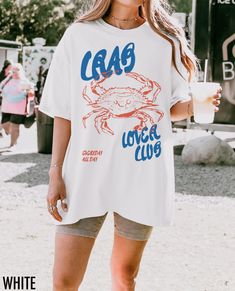 Show off your coastal cravings with this vintage-inspired tee! Featuring a retro crab graphic and the phrase "Crab Lover Club, Everyday All Day," this shirt is perfect for seafood enthusiasts who love a touch of retro flair. We use professional quality DGT printing on all our apparel. Direct-to-garment, or DTG, is a high quality printing method that sprays ink directly onto the garment so there is no peeling or cracking. This fabulous graphic will be printed on a Comfort Colors Unisex T-Shirt. P Crab Fashion, Crab Shirt, Retro Graphic Tees, Graphic Inspiration, Woman's Fashion, Vintage Aesthetic, Summer Shirts, Comfort Colors, Crab