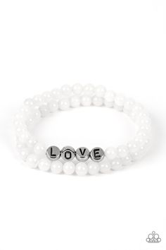 Cloudy beads in subtle shades of white extend around the wrist on elastic stretchy bands for a two-for-one romantic stack. Centered on one of the white bracelets, silver discs stamped with individual black letters spell out the word "love."

 Sold as one individual bracelet. The Word Love, Bracelets Silver, White Bracelet, Inspirational Bracelets, Word Love, White Bracelets, Paparazzi Accessories, Stretchy Bracelets, Latest Jewellery