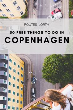 a woman standing on top of a roof with the words 50 free things to do in copenhagen