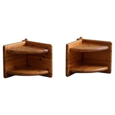 two wooden shelfs made out of logs