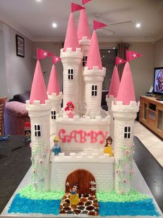 a birthday cake that is shaped like a castle