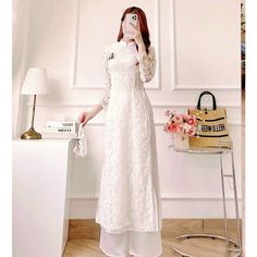 👉 7 DAY REFUND SUPPORT FOR CUSTOMERS IN VIETNAM * Still a Vietnamese girl walking down the street, how beautiful are her innovative ao dai. Selected from the best materials, the 4-piece modern ao dai will bring her the perfect experience. * With a delicate ao dai design in the flower-embroidered sleeves, a little bit of momentum with a stylized side part, this innovative ao dai can turn any girl into a beautiful lady. , young, lovely. * Ao dai in different colors such as pink and beige helps he Lace Ao Dai For Wedding, Fitted White Ao Dai For Ceremonies, Elegant Long Dresses For Ceremony, Spring A-line Wedding Gown, Spring Wedding A-line Gown, Elegant Ao Dai For Spring Wedding, Lace Fitted Ao Dai For Wedding, Elegant Wedding Ao Dai For Spring, Spring White Gown For Banquet