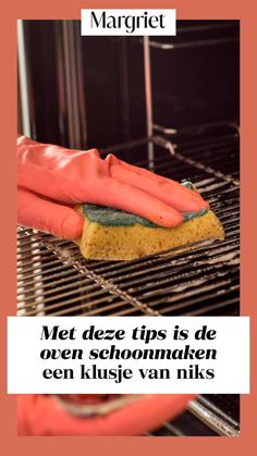 a person is cleaning an oven with a sponge on it and the words margiet written in german