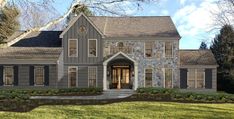 this is an artist's rendering of a house in the country style with stone and shingles