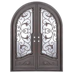 an ornate iron door with glass panels on the front and side doors, both in dark brown