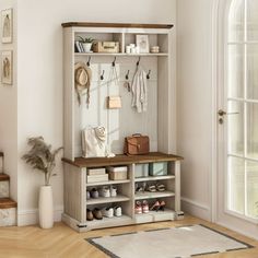 an entryway with shoes and purses on the shelves