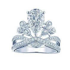 a white gold engagement ring with a pear shaped diamond