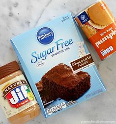 two boxes of sugar free brownies next to each other on a marble counter top