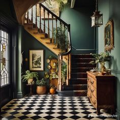 a staircase with potted plants next to it and a checkered floor in the hallway