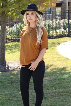 henley short sleeve knit top functional button tabs 100% cotton color: burnt orange our model Alex is 5'4 and wearing size Small. Relaxed Fit Short Sleeve Henley With Buttons, Brown Cotton Tops With Buttons, Brown Crew Neck Top With Buttons, Everyday Relaxed Fit Short Sleeve Henley, Orange Short Sleeve Top With Buttons, Brown Short Sleeve Tops With Buttons, Relaxed Fit Short Sleeve Everyday Henley, Everyday Cotton Henley With Relaxed Fit And Short Sleeves, Summer Everyday Henley With Button Closure