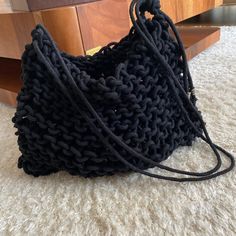 hand made shoulder bag, knitting black bag. summer bag It is 100% hand knitted. It is lined and has 2 magnet closures. Content: Cotton Cord Dimension: Width : 36 cm Height : 27 cm Handle Length: 89 cm Bag Knitting, Bag Summer, Sling Bags, Summer Bag, Cotton Cord, Black Bag, Cross Body Handbags, Purses And Handbags, Hand Knitting