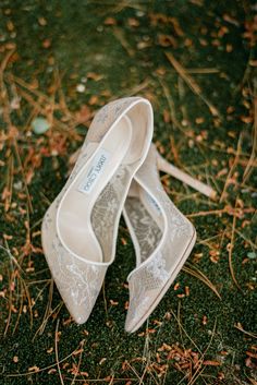 the bride's wedding shoes are on the ground