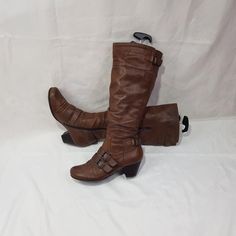 Offering you brown women's leather knee-length boots with round toe. Fashion 90's - 2000's. Vintage boots in boho style, will emphasize the beauty of your legs. Thanks to the elastic band in the upper part, it fits well around the shin. With the buckle, you can adjust the size to fit your shin. Made of soft leather. Comfortable model on a not large, stable heel, will complement any image. In a single copy. Limited edition, in good condition. Materials: leather The circumference calf width - 14 - Brown Wide Calf Knee-high Boots, Vintage Brown Knee-high Boots For Winter, Brown Knee-high Boots With Buckle Closure And Round Toe, Brown Knee-high Boots With Buckle Closure, Wide Calf Vintage Mid-calf Boots, Brown Knee-length Heeled Boots For Winter, Brown Wide Calf Boots With Buckle Closure, Brown Wide Calf Mid-calf Boots, Fitted Brown Faux Leather Platform Boots