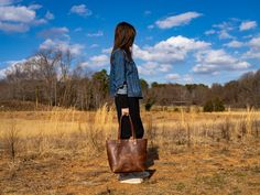 Classic Chestnut Leather Tote Bag Leather Tote bag is a must-have in every woman's wardrobe. It gets with anything and works for any occasion. Traveling, academics, shopping, dating, work or parties - tote bag has you covered. Our leather tote is very roomy and can keep all your essentials no matter where you go. Despite its spaciousness, the tote bag looks elegant and sleek. It is made of natural leather and features convenient design with pockets inside, key carabiner and a magnetic snap closu Fall Leather Lined Tote Shoulder Bag, Fall Leather-lined Shoulder Bag, Medium Satchel With Top Carry Handle, Fall Shoulder Bag With Leather Lining, Leather-lined Tote Bag For Fall, Casual Satchel With Leather Lining, Fall Tote Bag With Leather Lining, Medium Fall Bags For Everyday Use, Medium Satchel With Leather Handles For Everyday Use